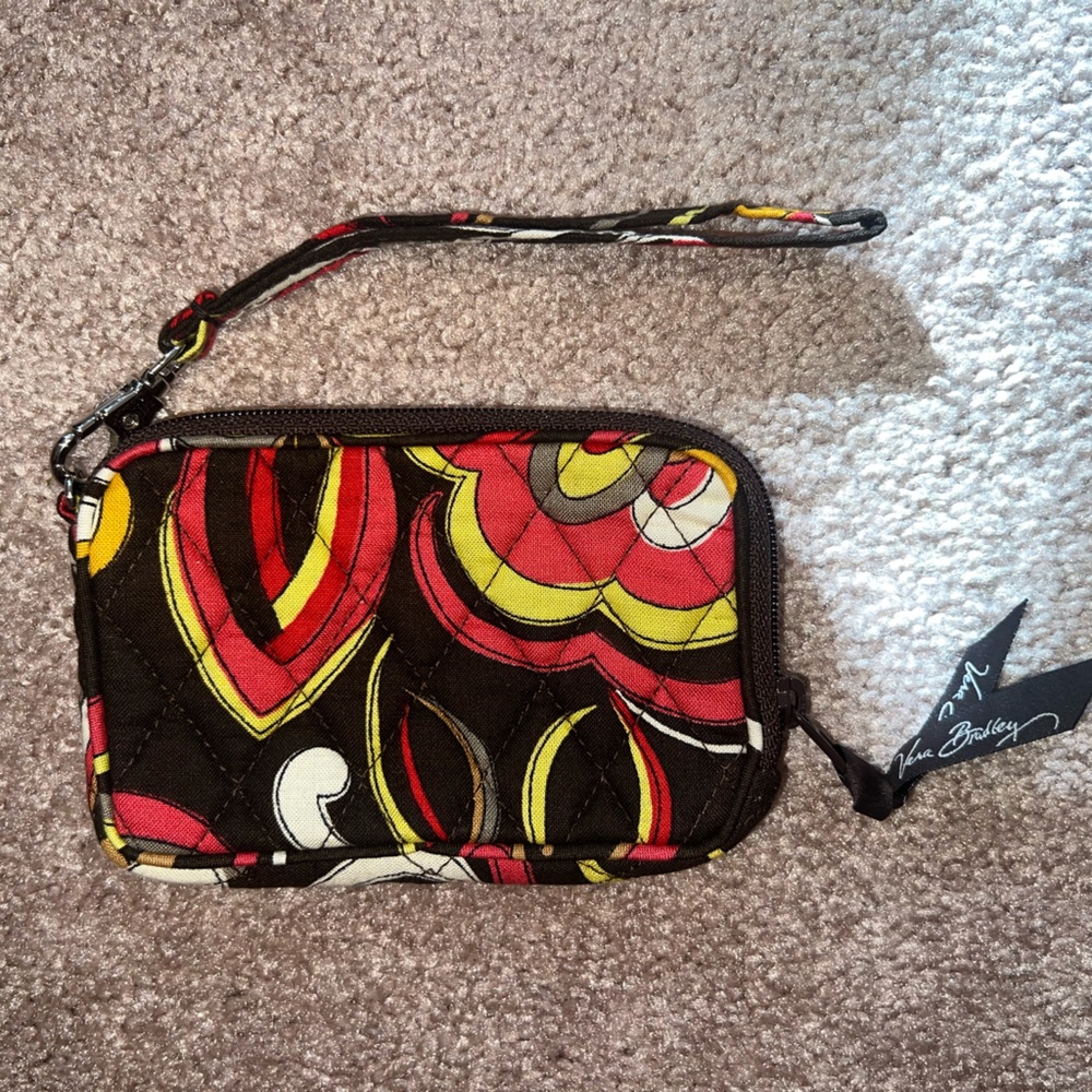 Vera Bradley wallet. Brand new. Never used. Great condition.